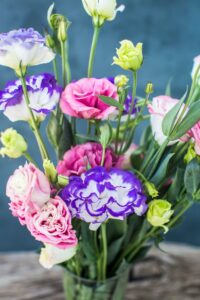 Lisianthus bouquet on a wooden table
